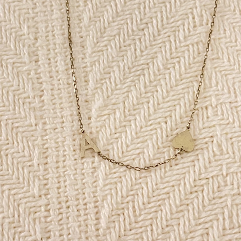Dainty gold plated sterling silver necklace with a gold ❤️ and the letter A